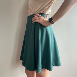 A-line teal skirt.